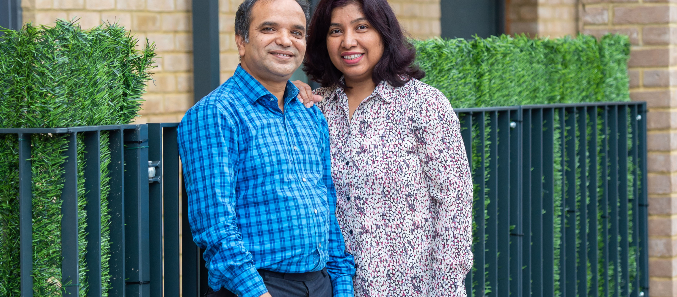 Couple in front of Bellway home